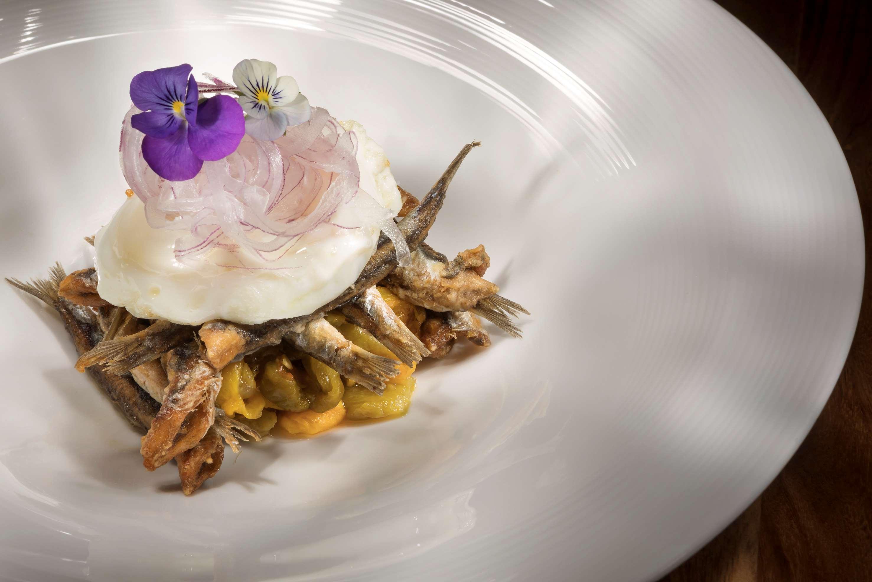 Hotel Me Marbella Exteriér fotografie A dish of anchovies